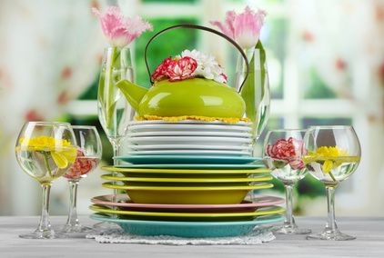 Teapot and colorful plates